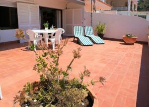 Vonkajšia záhrada v ubytovaní Precioso apartamento con vistas en Roses AV-41