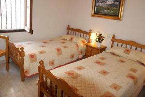 Posteľ alebo postele v izbe v ubytovaní Precioso apartamento con vistas en Roses AV-41