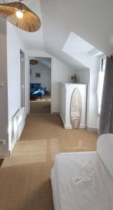 Łóżko lub łóżka w pokoju w obiekcie Appartement Ty Cosy