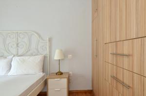 Posteľ alebo postele v izbe v ubytovaní Exarchia, a nice and cozy apartment