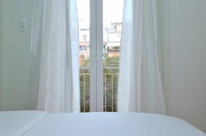 Posteľ alebo postele v izbe v ubytovaní Patisia, a minimal apartment