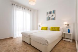 Кровать или кровати в номере Ama Islantilla Resort