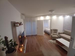 Postel nebo postele na pokoji v ubytování Apartman Milan'o