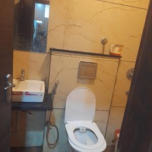 Koupelna v ubytování Hotel Coral