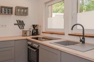 Kuchyň nebo kuchyňský kout v ubytování Dünenblick 4 + 16 fotografií