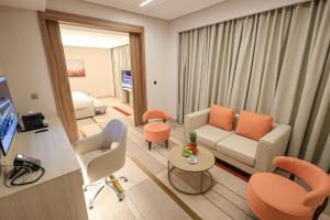 TV a/nebo společenská místnost v ubytování Swisstouches Hotel Amman