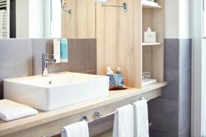 Phòng tắm tại 3-Raum-Ferienwohnung mit Meerblick,