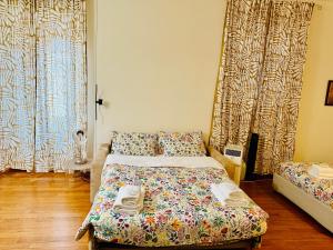 Postel nebo postele na pokoji v ubytování TURATI ROOMs