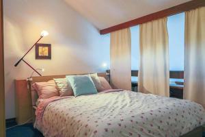 Posteľ alebo postele v izbe v ubytovaní Residence SOLARIA