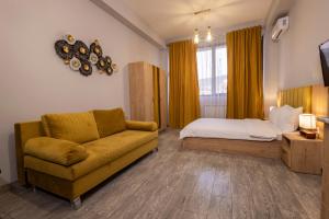 Rúm í herbergi á Horizon Hotel Yerevan