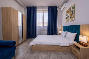 Rúm í herbergi á Horizon Hotel Yerevan