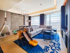 Posezení v ubytování Kempinski Residences Guangzhou - Free shuttle between hotel and Exhibition Center during Canton Fair & Exhibitor registration Counter