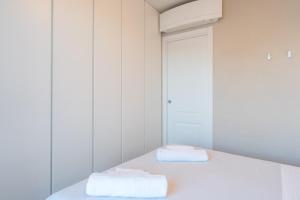 A bed or beds in a room at La Roseta