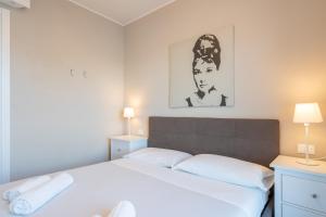 A bed or beds in a room at La Roseta