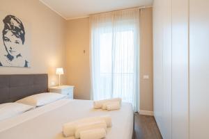 A bed or beds in a room at La Roseta