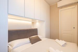 A bed or beds in a room at La Roseta