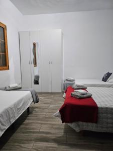 Postel nebo postele na pokoji v ubytování Villa de Ingenio JAVAZU