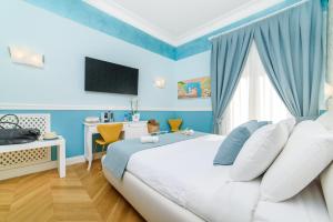 TV a/nebo společenská místnost v ubytování Sirenuse Home & Suites