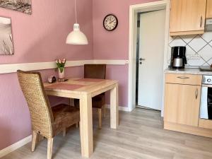 Kuchyň nebo kuchyňský kout v ubytování Ferienwohnung Dünennest + 16 fotografií