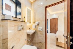 Koupelna v ubytování Kyomi Service Apartments + 37 fotografií