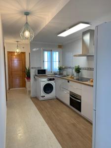 Η κουζίνα ή μικρή κουζίνα στο Apartamento frente al mar en Balerma