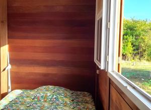 Postel nebo postele na pokoji v ubytování Chambre Maison Kumba