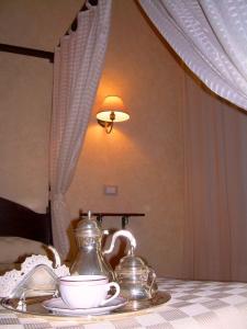 Postel nebo postele na pokoji v ubytování B&B Cortile Di Venere
