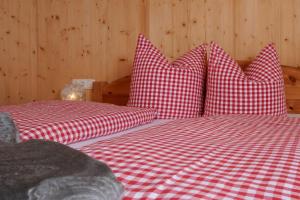 Łóżko lub łóżka w pokoju w obiekcie Maries Ferienhaus MAY-100