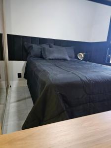 Postel nebo postele na pokoji v ubytování Lindo Studio na Frente do Shopping Eldorado Completo! + 14 fotografií