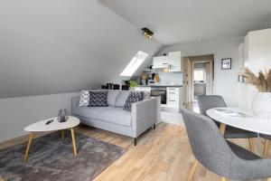 Kuchyň nebo kuchyňský kout v ubytování Appartement Nele Kieler Straße 16a APPARTO Grömitz + 17 fotografií