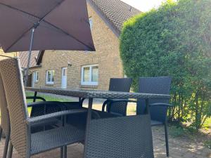 Patio nebo venkovní prostory v ubytování Appartement Nele Kieler Straße 16a APPARTO Grömitz