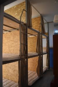 Letto o letti in una camera di SLEEP STUDIO Hostel