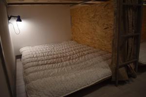 Letto o letti in una camera di SLEEP STUDIO Hostel