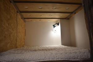 Letto o letti in una camera di SLEEP STUDIO Hostel