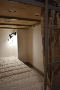 Letto o letti in una camera di SLEEP STUDIO Hostel