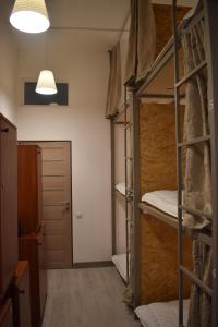 Letto o letti in una camera di SLEEP STUDIO Hostel