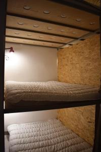 Letto o letti in una camera di SLEEP STUDIO Hostel