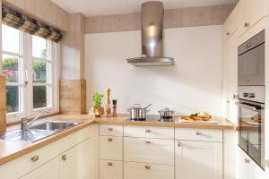 Küche/Küchenzeile in der Unterkunft Ferienwohnung Lachmöwe