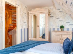 Ein Bett oder Betten in einem Zimmer der Unterkunft Ferienwohnung Lachmöwe