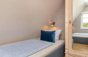 Ein Bett oder Betten in einem Zimmer der Unterkunft Ferienwohnung Lachmöwe