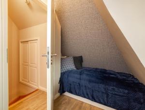 Ein Bett oder Betten in einem Zimmer der Unterkunft Ferienwohnung Lachmöwe