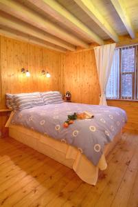 Postel nebo postele na pokoji v ubytování Discovery Cottage