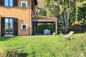 A garden outside Pretty home in a resort with pool! - Casa Aurora