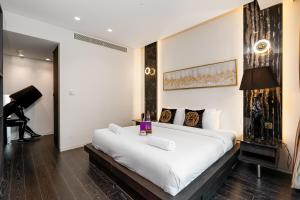 Postel nebo postele na pokoji v ubytování High End Luxury Stay with Full Palm Jumeirah View