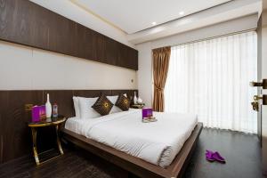 Postel nebo postele na pokoji v ubytování High End Luxury Stay with Full Palm Jumeirah View