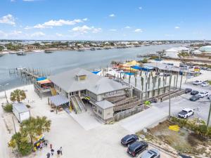 an aerial view of a marina with cars parked at La Playa 301 in Perdido Key
