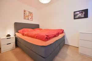 En eller flere senge i et værelse på FeWo Mardus Nr 45 - Sol Mare