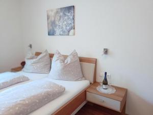 Postel nebo postele na pokoji v ubytování Beim Orgeler