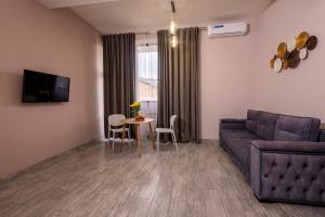 Sjónvarps- og/eða afþreyingartæki á Horizon Hotel Yerevan