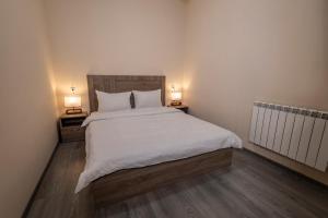 Postel nebo postele na pokoji v ubytování Horizon Hotel Yerevan